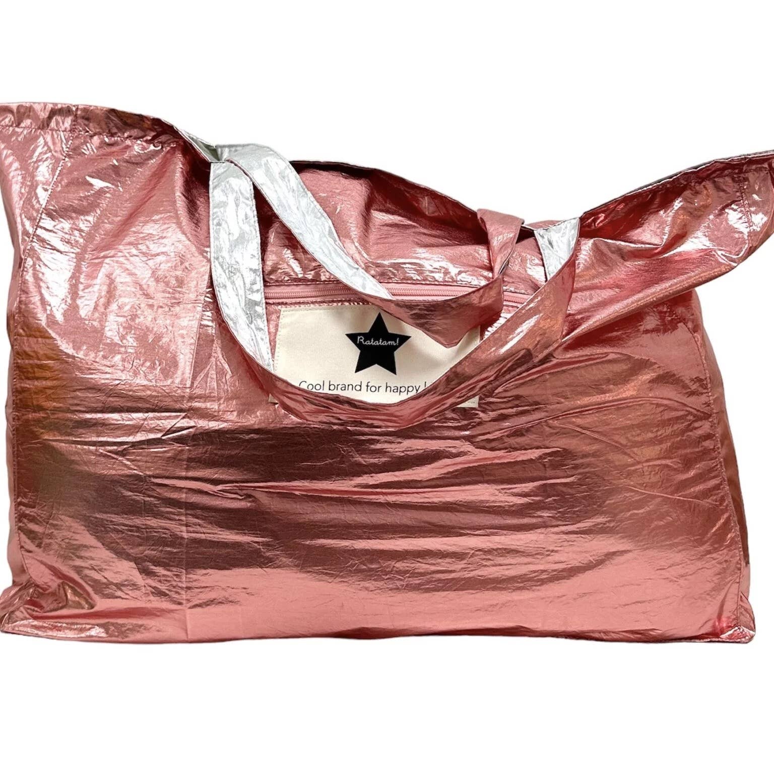 Rose gold bag with a visible brand logo on a white background