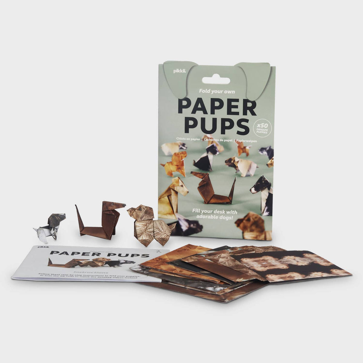 Paper Pups packaging with cut-out dog shapes on a white background