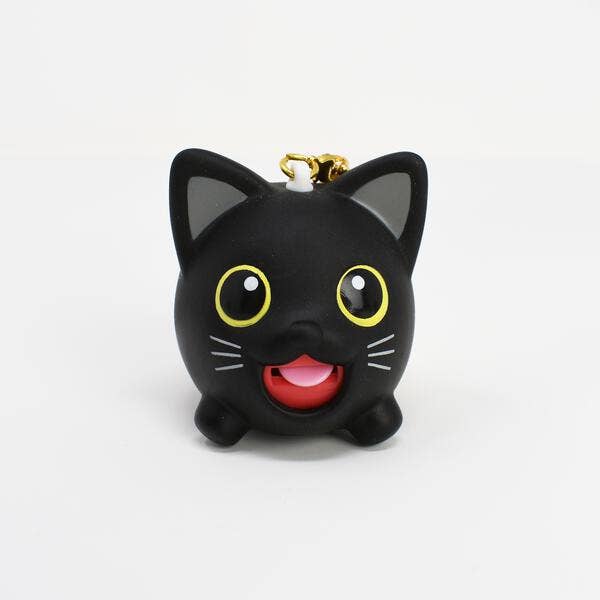 Black cat-shaped keychain with yellow eyes and a red tongue on a white background