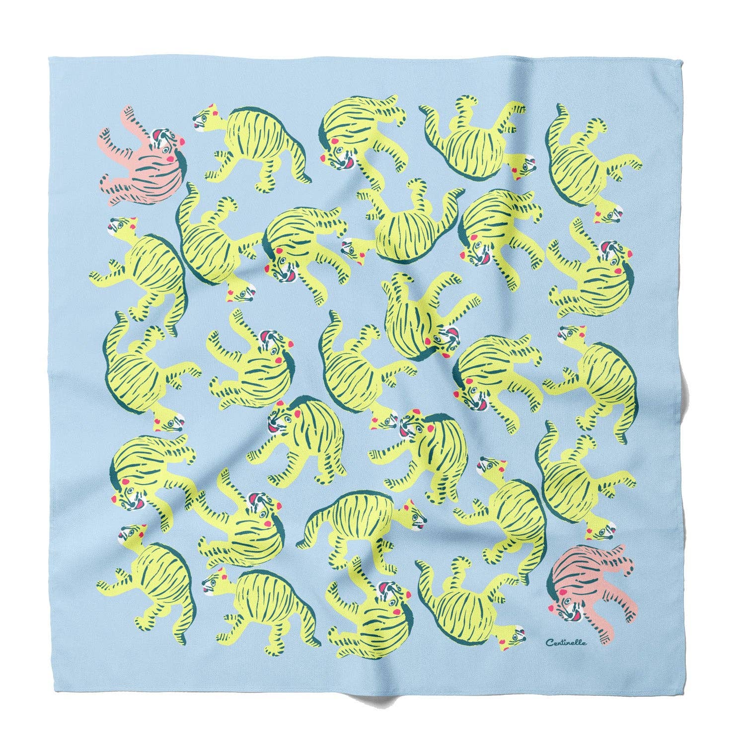 Cloth scarf with colorful tiger pattern on a light blue background