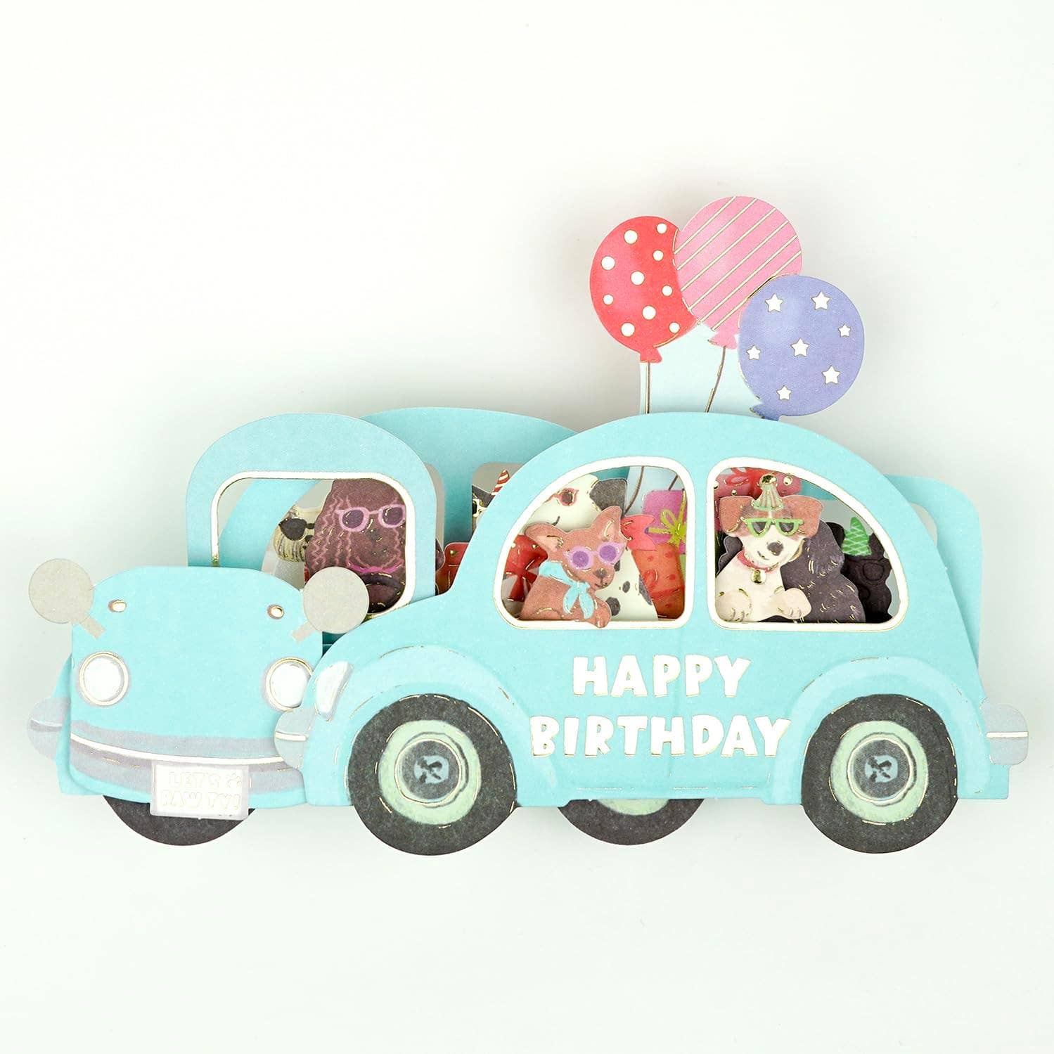 Toy car with 'Happy Birthday' text and small figures inside, on a white background