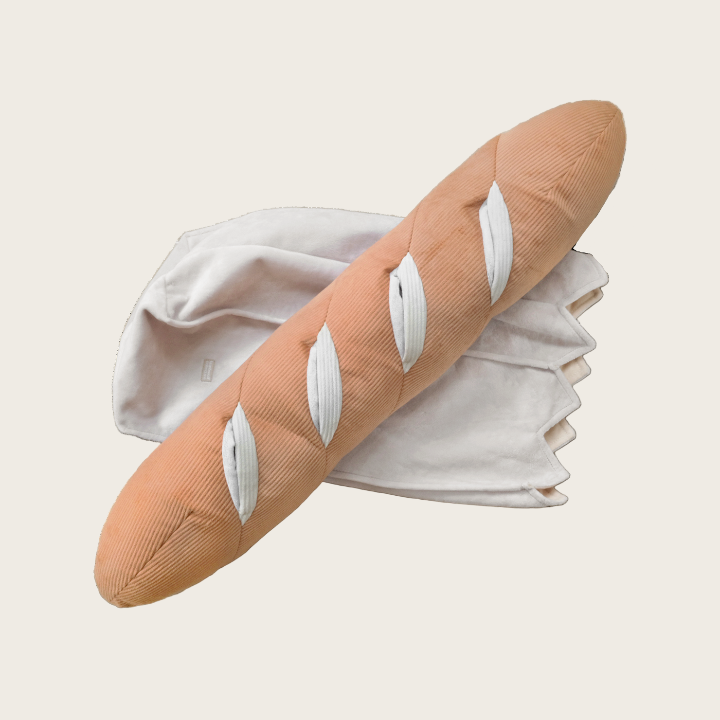 Plush toy shaped like a baguette on a white background