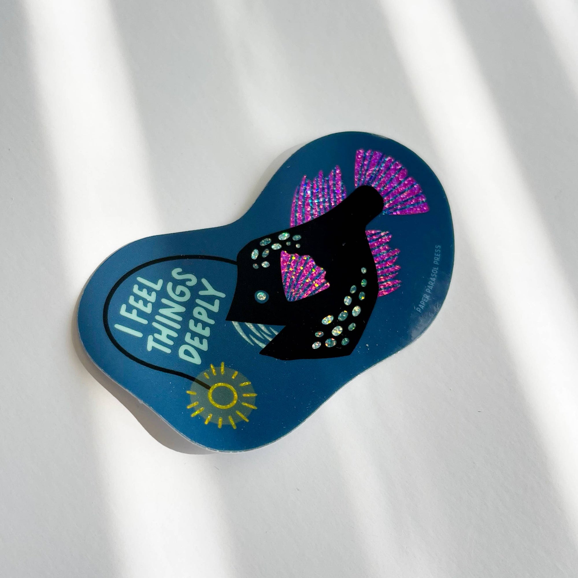 Blue sandal with text and decorative elements on a white background