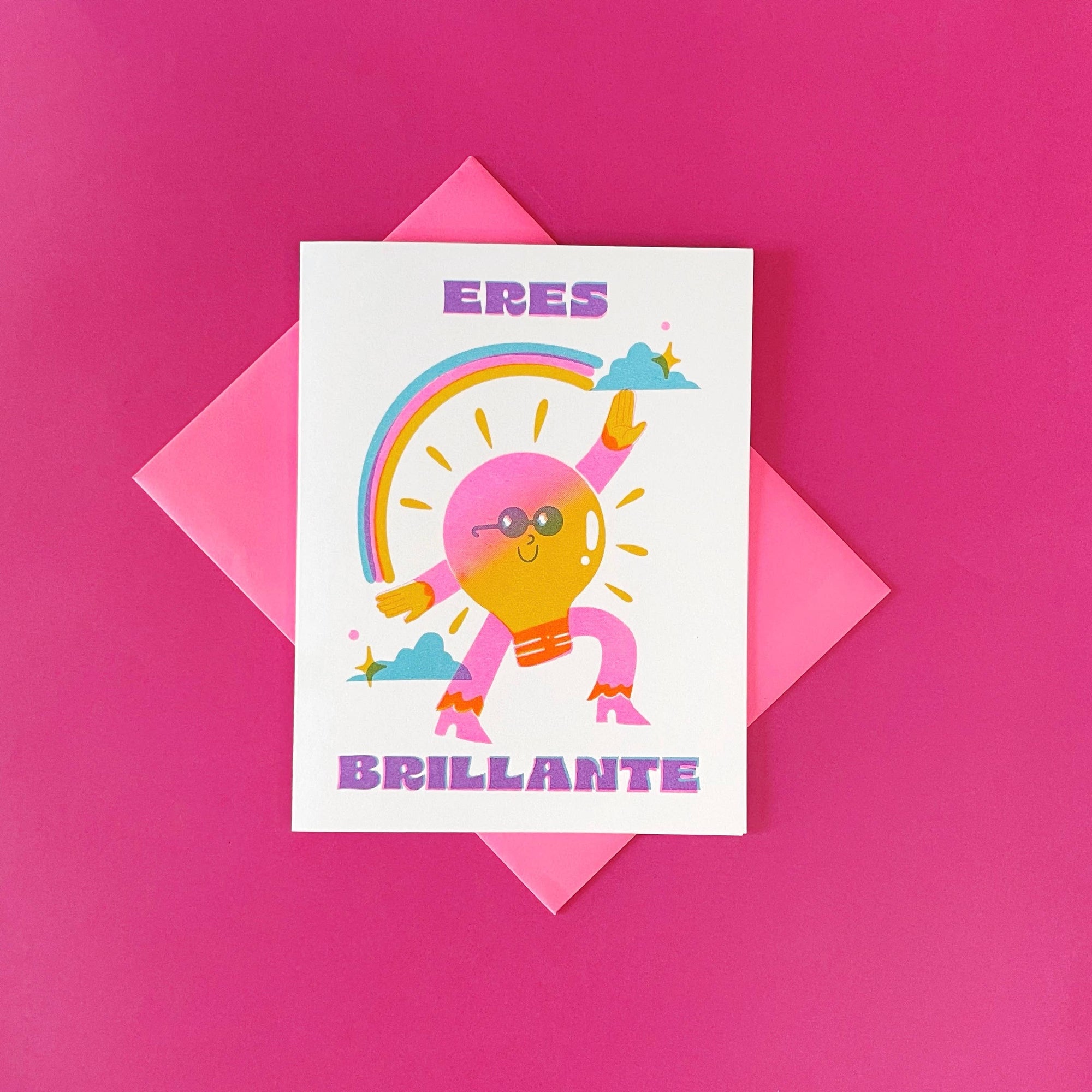 Card with a colorful illustration of a sun character and text on a pink background