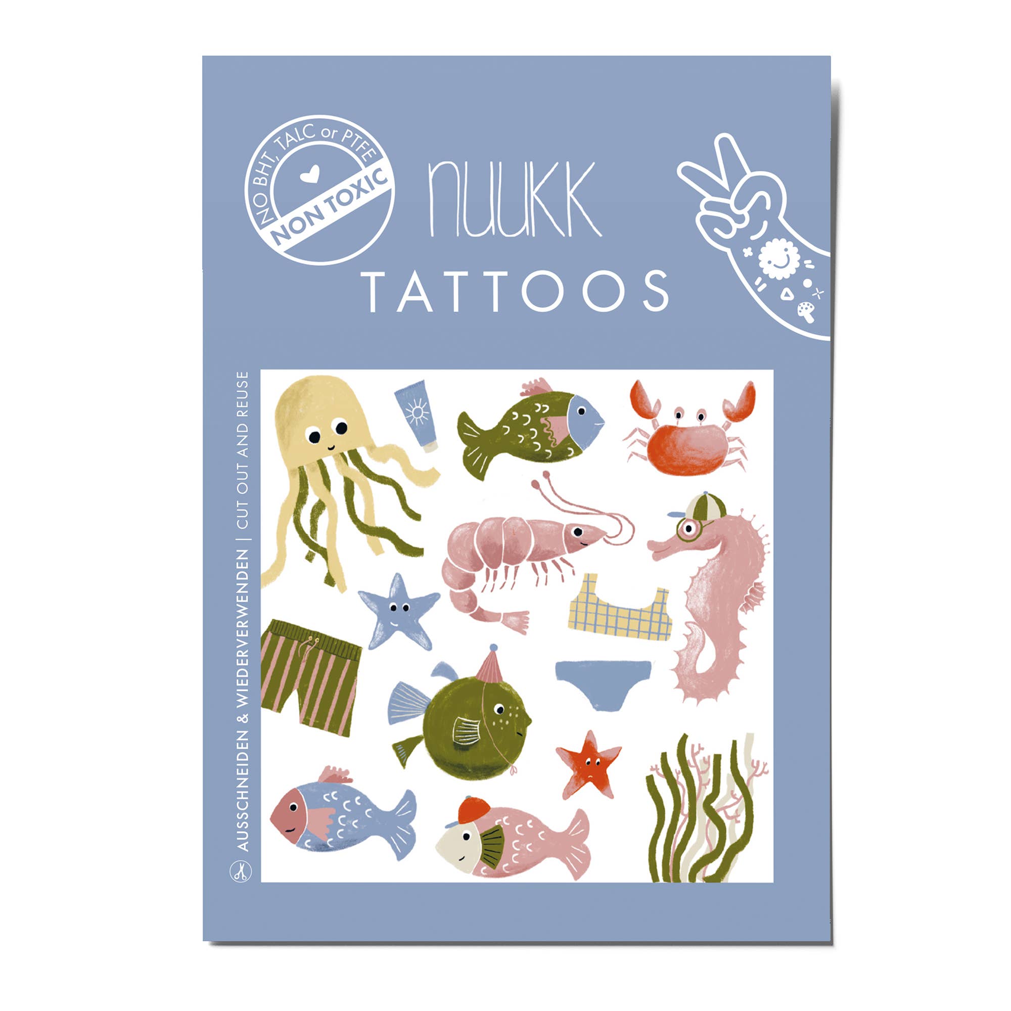 A package of 'nuukk TATTOOS' featuring cute, colorful underwater-themed temporary tattoos. The packaging has a dusty blue background with illustrations of a jellyfish, crab, seahorse, starfish, and fish, alongside a 'CERTIFIED NON TOXIC' badge.