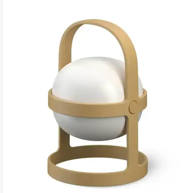 White spherical object with a beige handle on a white background
