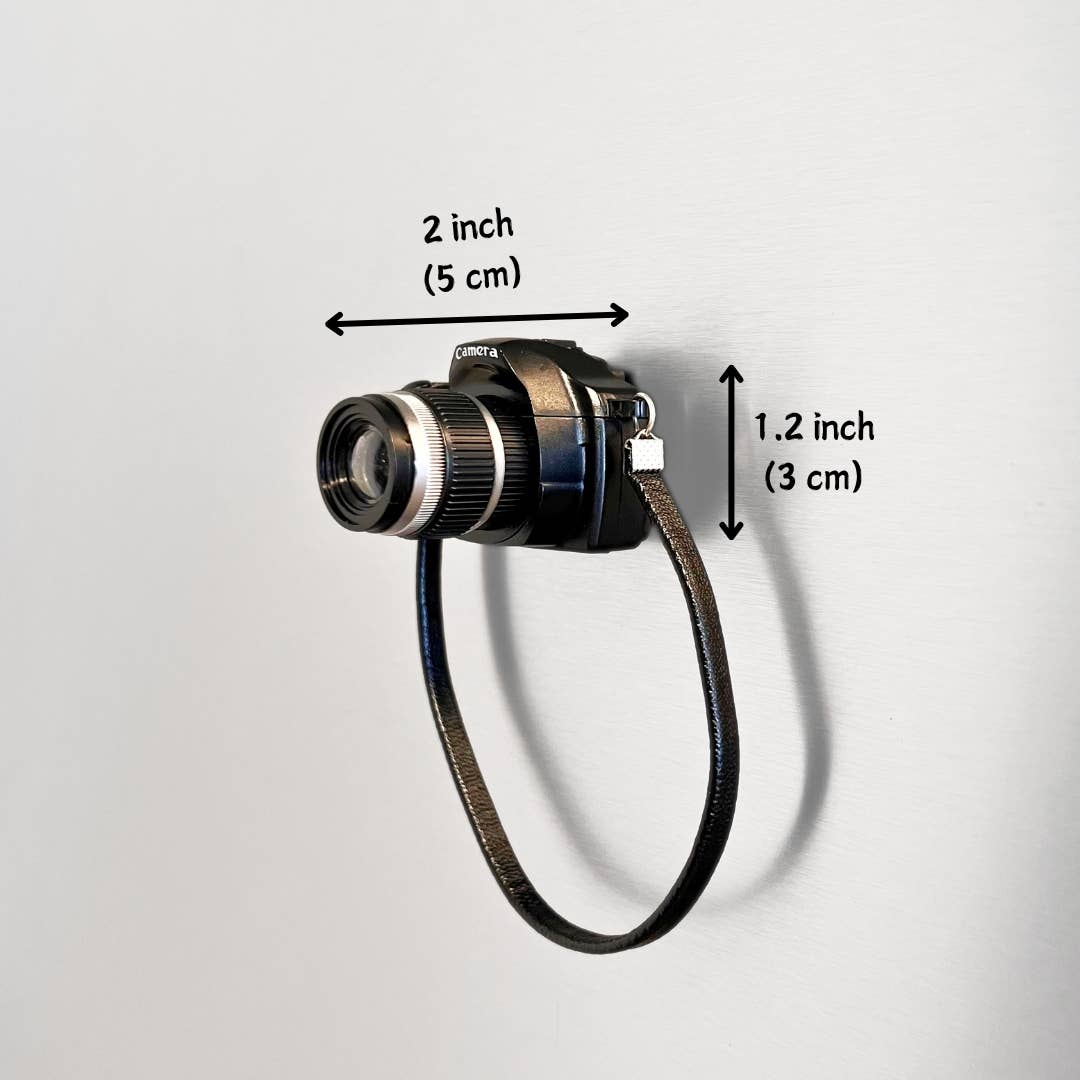 Camera lens with measurement labels on a light gray background