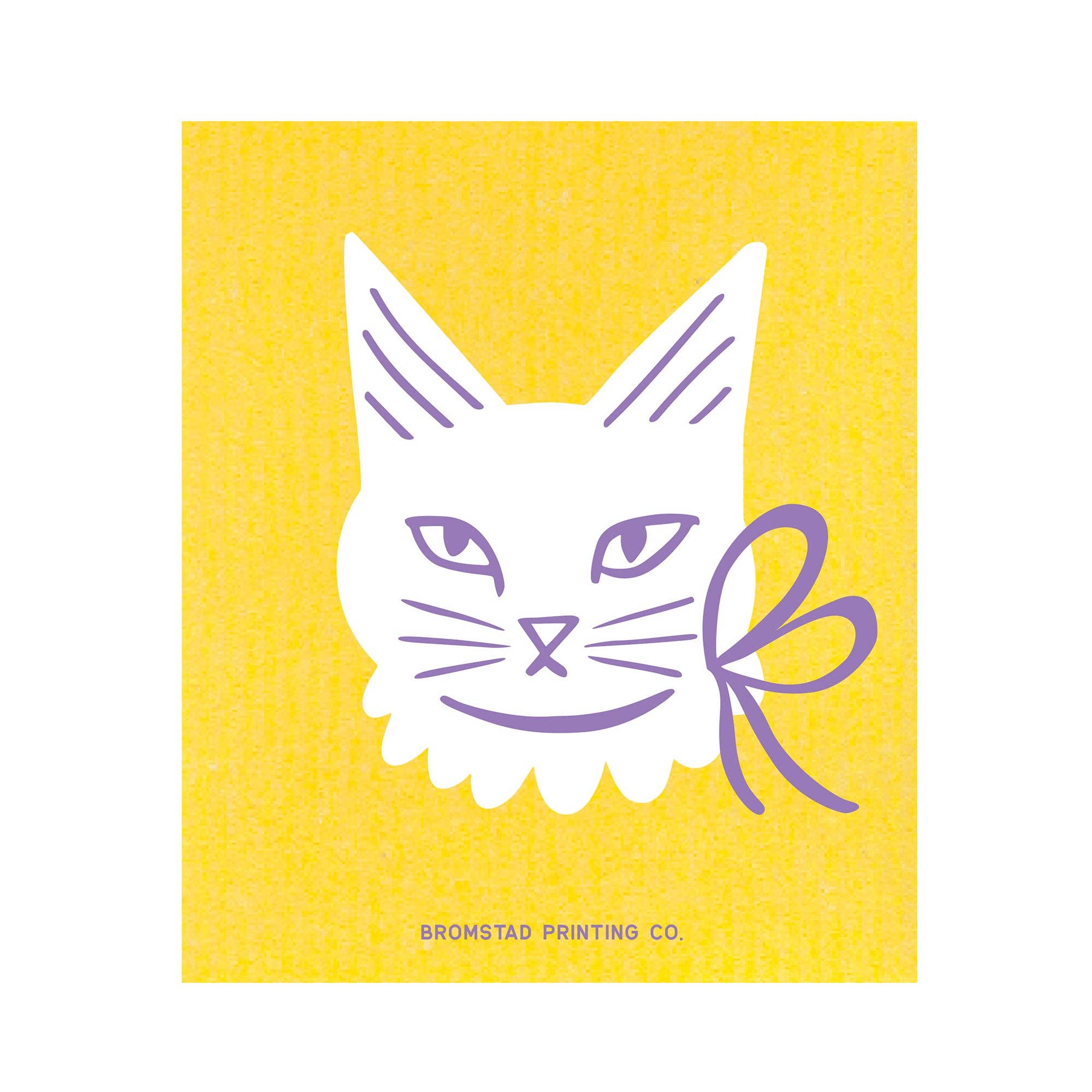 Yellow towel with a white cat design and purple accents, featuring the brand 'Bromstad Printing Co'.