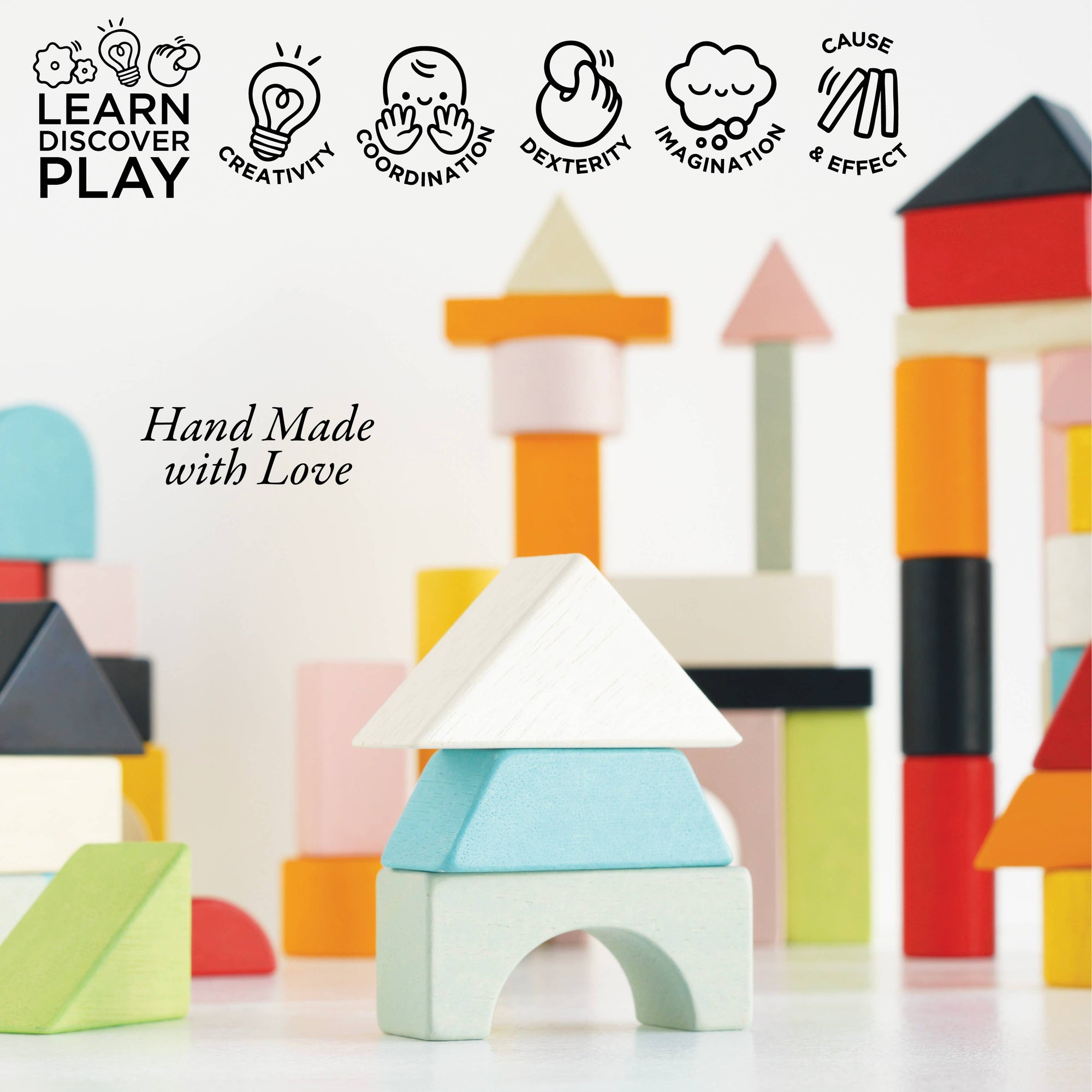 Colorful wooden building blocks with educational icons and 'Hand Made with Love' text on a light background.