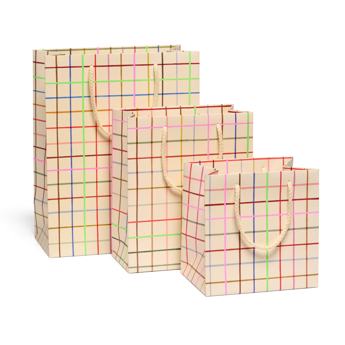 Three plaid paper bags with colorful lines on a white background