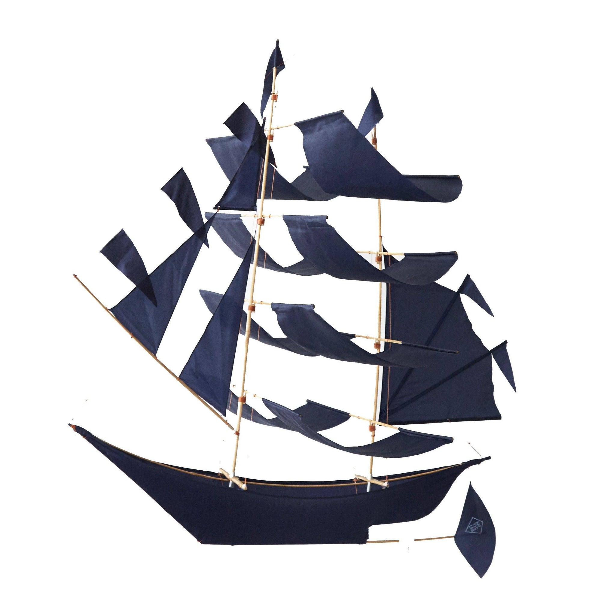 Decorative ship model with multiple sails on a white background