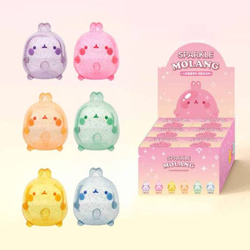 Set of colorful plush toys resembling Molang characters with a display box on a white background.