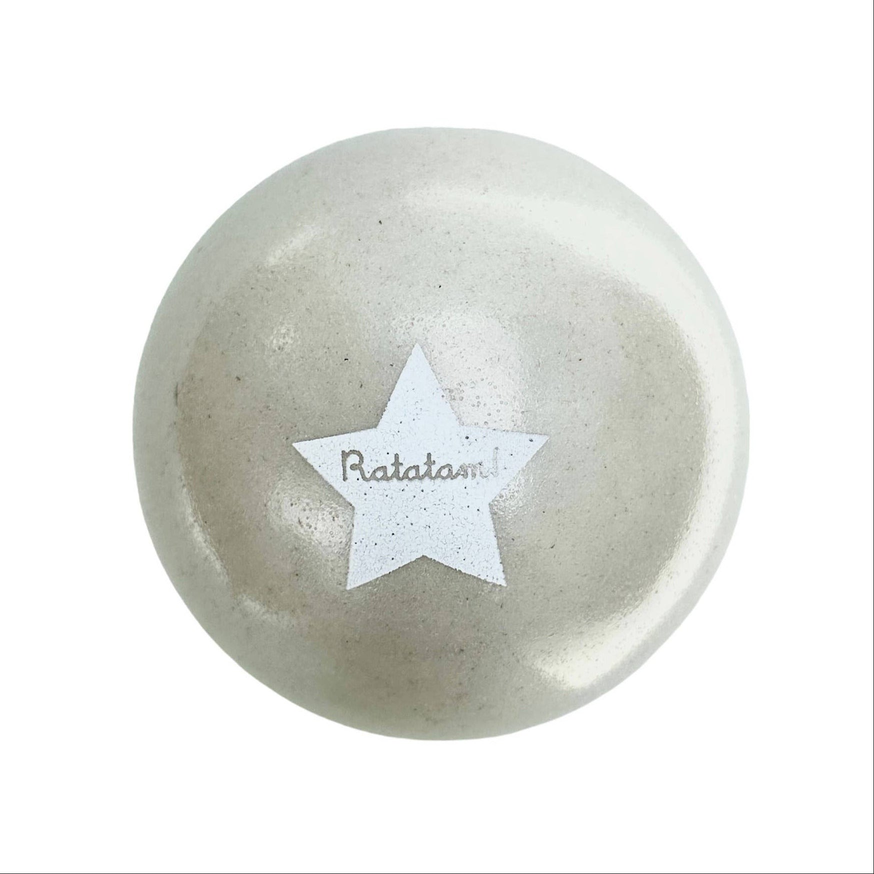 Round stone with a star-shaped cutout and 'Ratatoskr' engraving on a white background