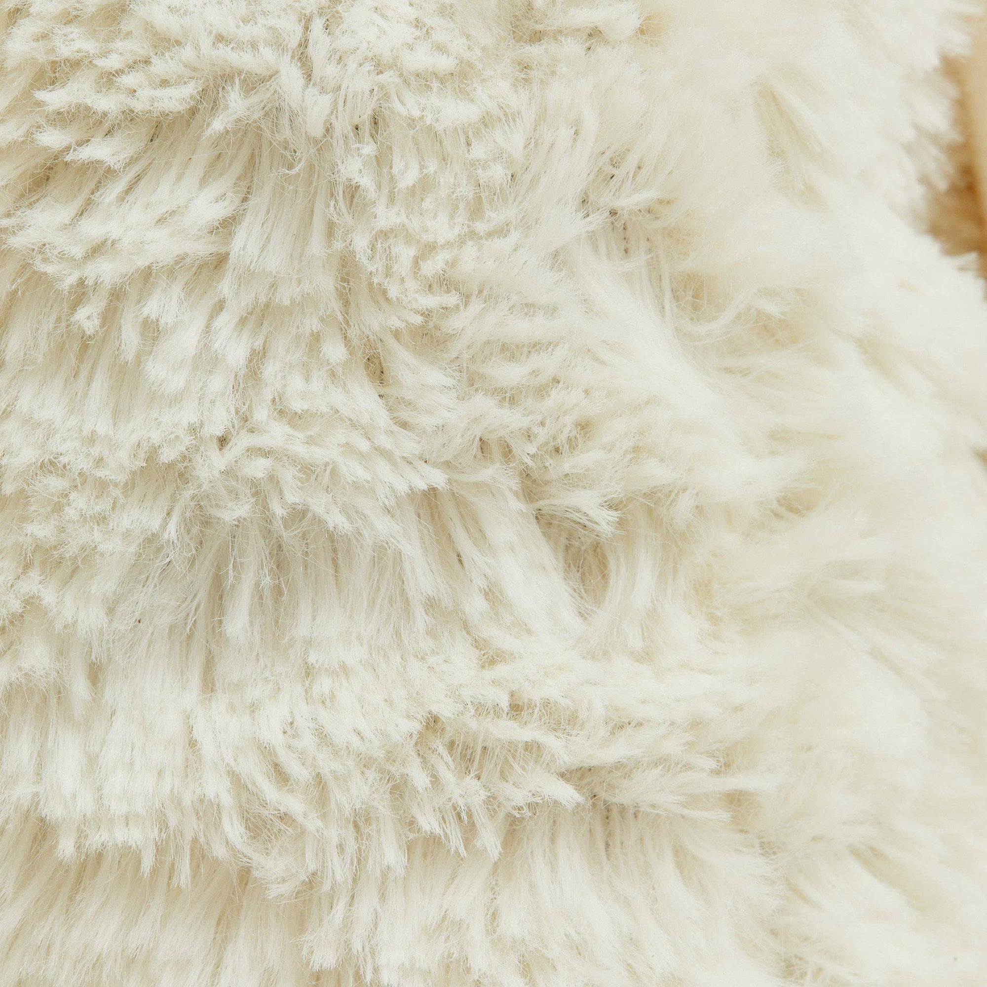 Close-up of beige and brown textured fabric