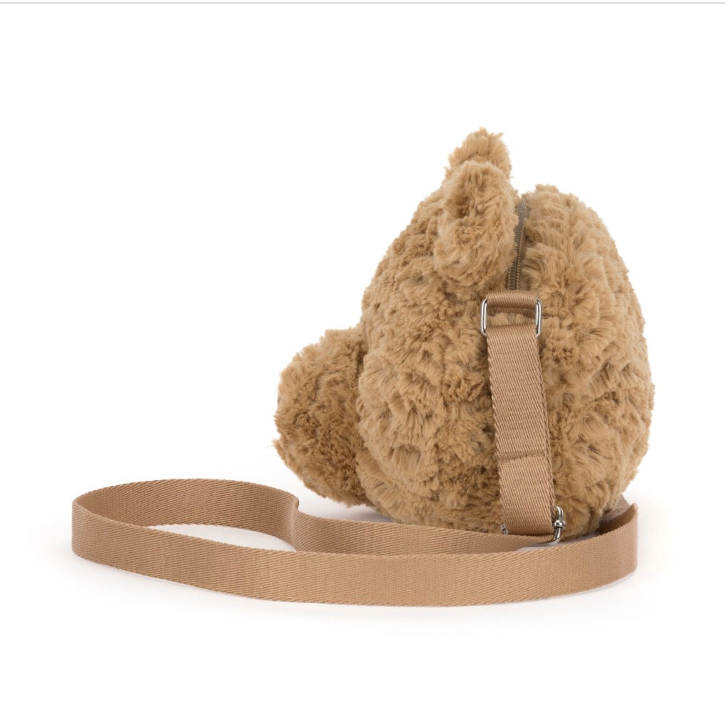 Brown fluffy bag with a strap on a white background