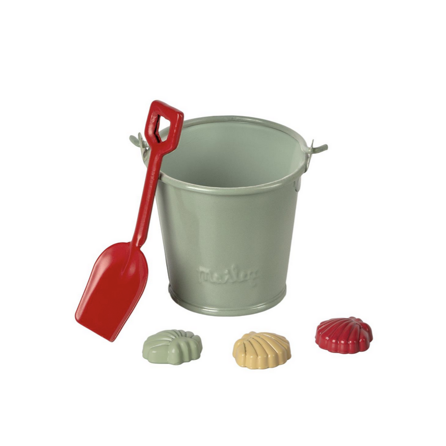 little sage beach bucket with red shovel and green, cream and red seashells