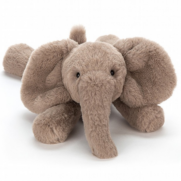 fuzzy elephant plush laying down
