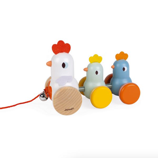 row of colorful wooden chickens, with bell and string