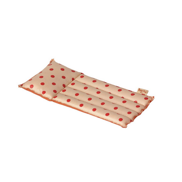 pool float with red dots