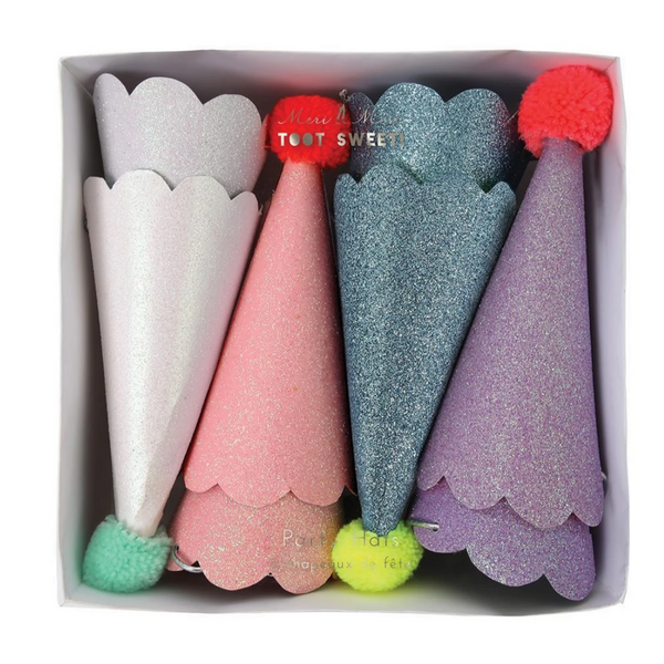 colorful glittery party hats in packaging