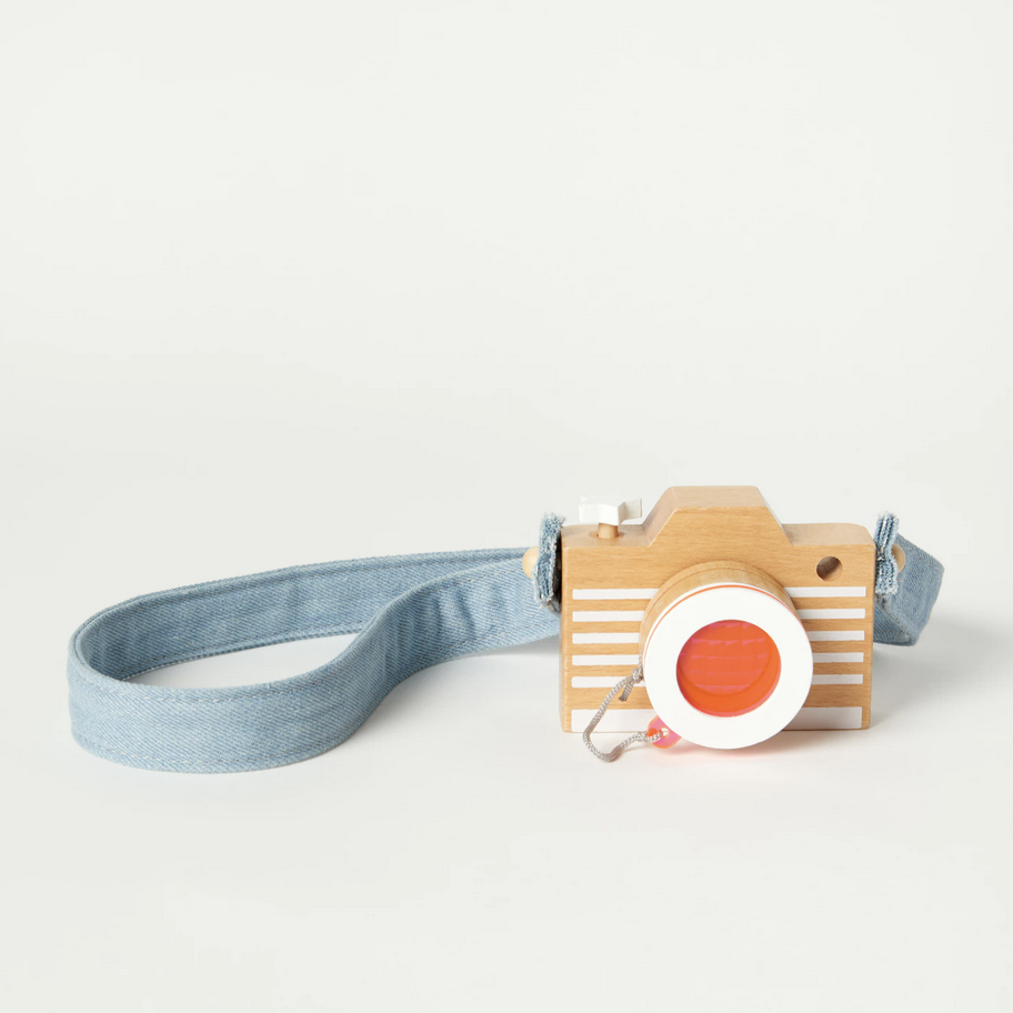 wooden camera with orange lens 
