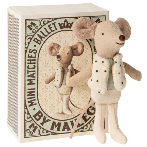 picture of dancer mouse with white spotted vest and box behind