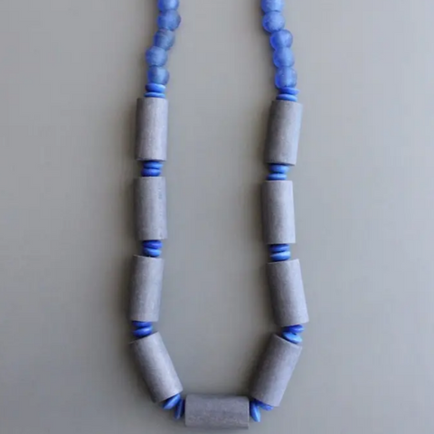 blue necklace with beads and logs