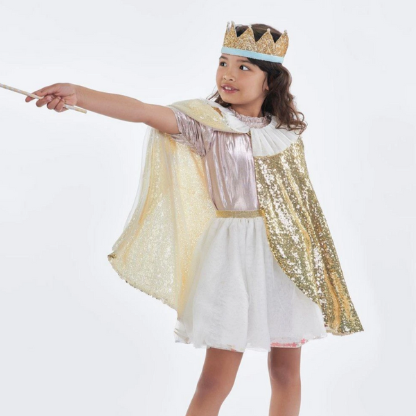 little girl wearing sparkly gold cape with white tulle collar holding golden star wand
