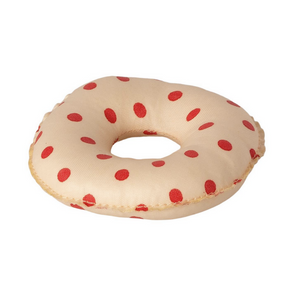 white inner tube with red polka dots