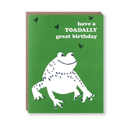 green card with white toad and white text