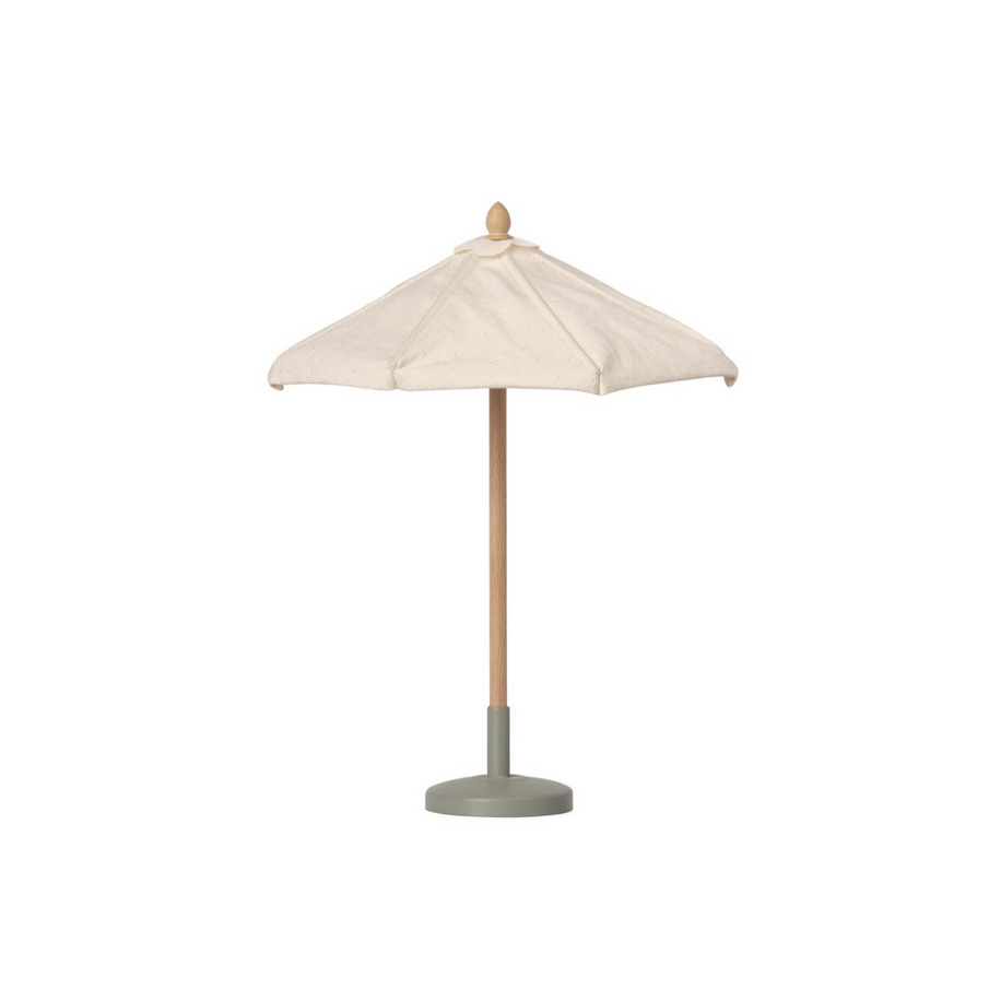 small white umbrella on stand