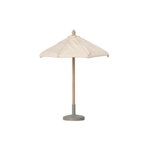 small white umbrella on stand