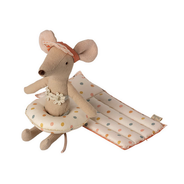 mouse wearing round flotie wth multi colored polka dots in front of long floaty