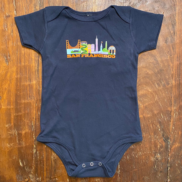 San Francisco icons picture above the words San Francisco on dark blue colored onesies