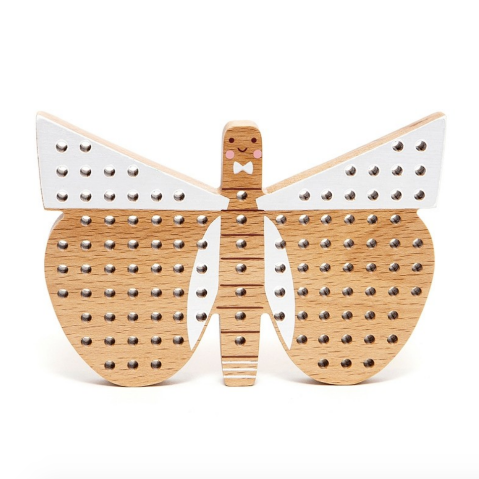 wooden butterfly to teach cross stitch
