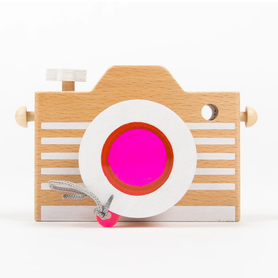 wooden camera with pink lens 