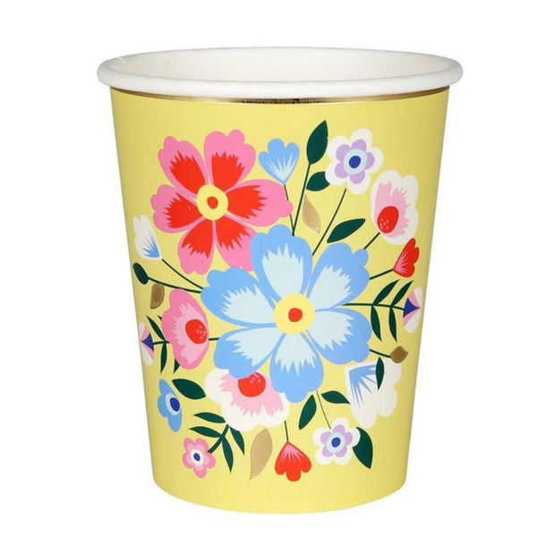 yellow cup with flowers
