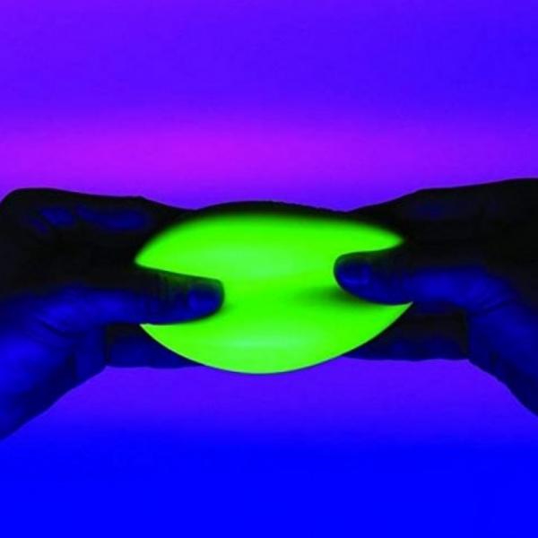 glowing ball of nee dough being stretched by two hands