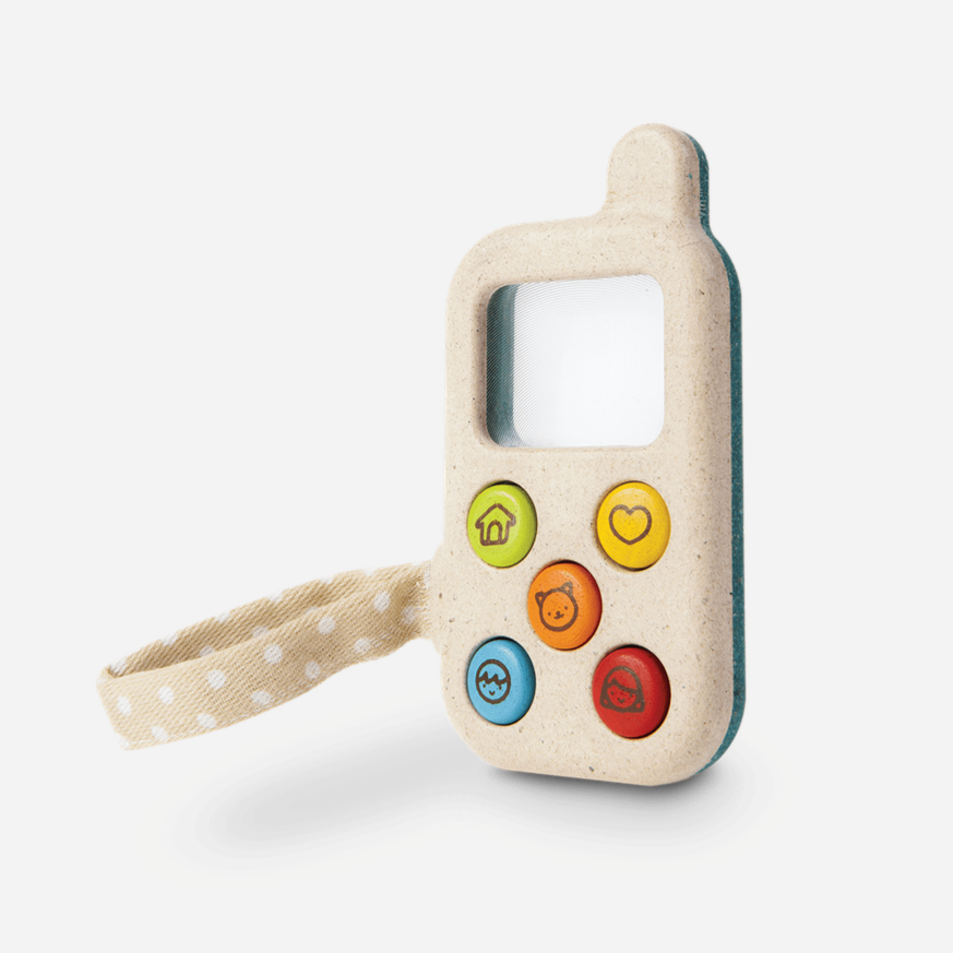 A compact, beige children's toy phone made of wood with colorful buttons and a magnifying glass screen.
