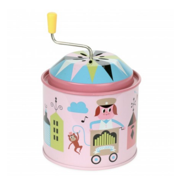 pink music box featuring a town and monkey 