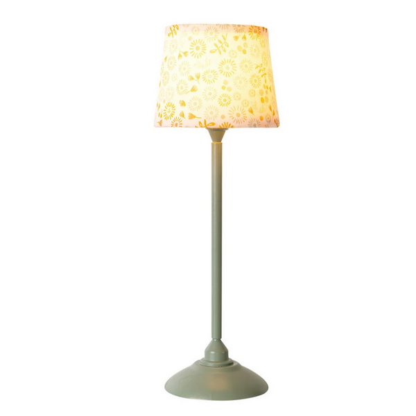 green lamp with yellow flower lampshade