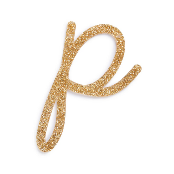 lowercase cursive p in gold acrylic with small holes to hang it.