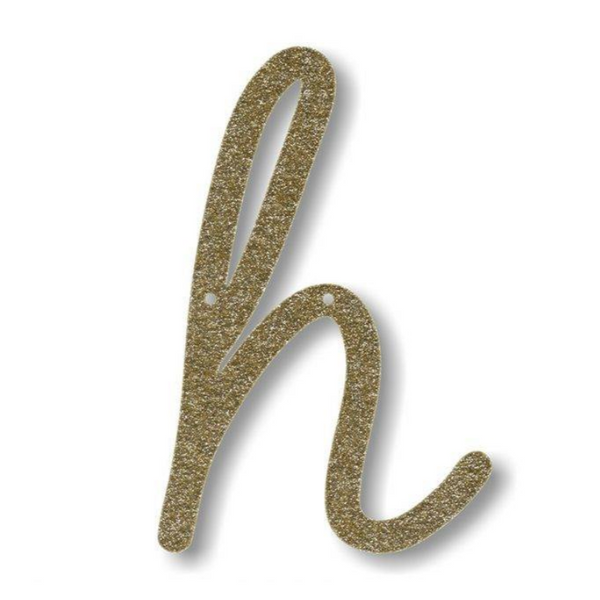 lowercase cursive h in gold acrylic with small holes to hang it.
