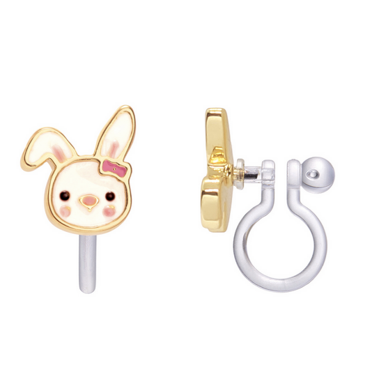 white bunny head wearing a pink bow clip on earrings