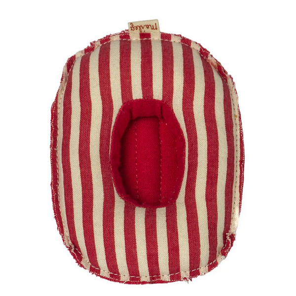 overhead view of red and white striped cloth boat meant to fit small mice
