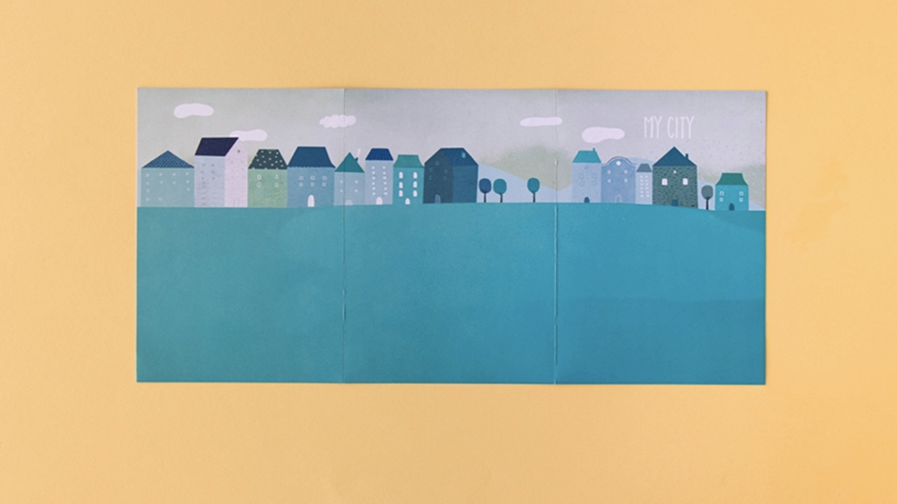 iside of sticker book featuring buildings