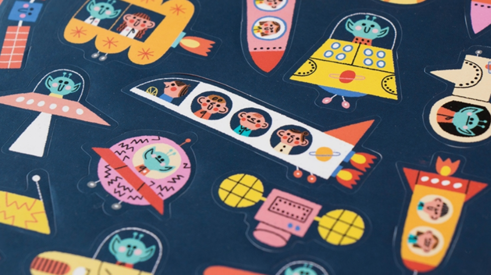 close up of rocket and alein stickers