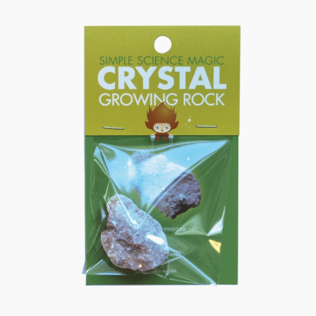 green packaging that reads "simple Sciencs Magic Crystal Growing Rock" 