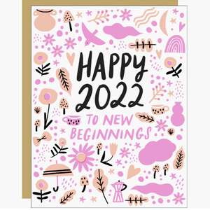 card with pink and peach flowers, unbrells, bird, rainbow icons reading "happy 2022 to new beginnings"