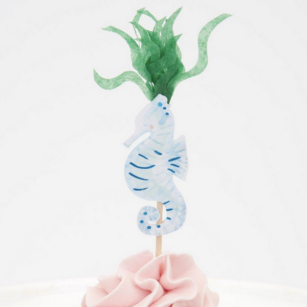 seahorse topper with green tissue grass on head